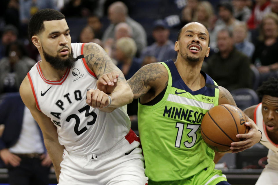 Minnesota Timberwolves guard Shabazz Napier (13) drives against Toronto Raptors guard Fred VanVleet (23) in the first quarter of an NBA basketball game Saturday, Jan. 18, 2020, in Minneapolis. (AP Photo/Andy Clayton-King)