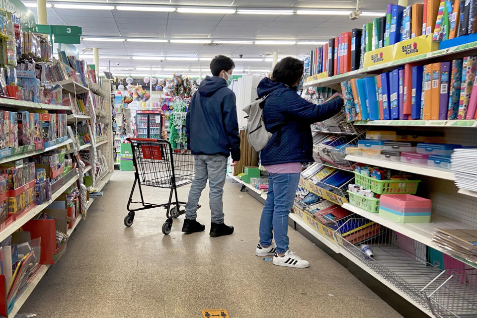 Customers shop at a Dollar Tree store on March 04, 2021 in Chicago. (Photo by Scott Olson/Getty Images)