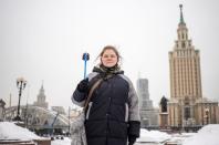 Participant of rally in support of Russian opposition politician Alexei Navalny, Marina Gulina, poses in Moscow