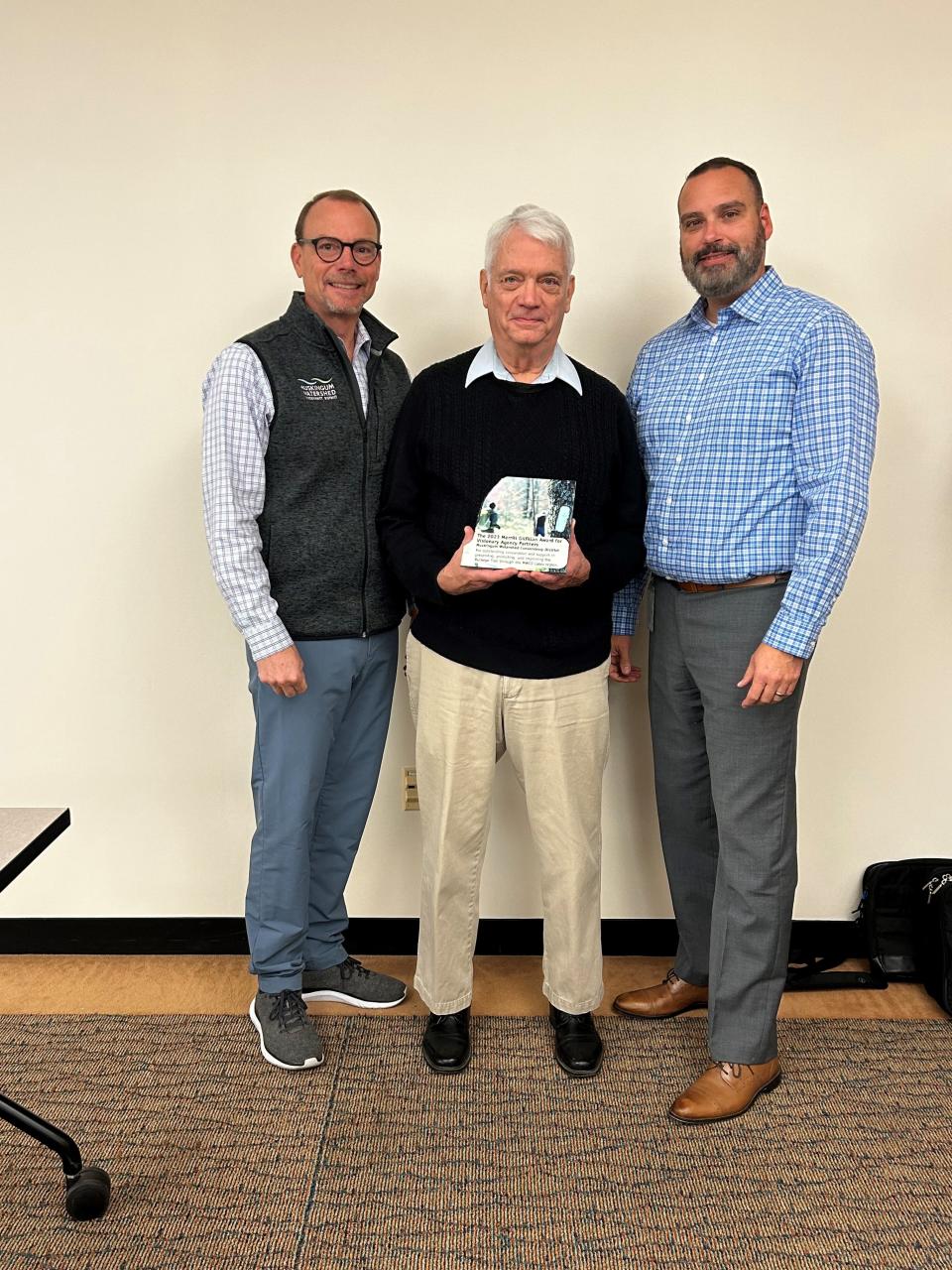 From left: Craig Butler, Muskingum Watershed Conservancy District executive director, Steve Walker, Buckeye Trail Association and Eric Stechschulte, MWCD deputy chief projects and planning with the Merrill Gilfillan Award for Visionary Agency Partners award.