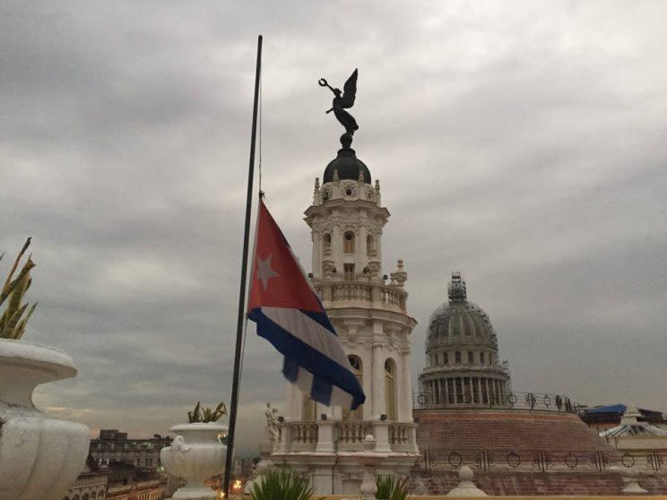 The Cuban flag is seen at half mast from the rooftop of the Hotel Inglaterra in Havana on Thursday, Dec. 1, 2016. Photo provided by Flemming. 