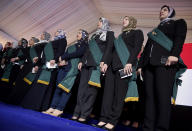 New judges attend a swearing-in ceremony before Egypt’s State Council, in Cairo, Egypt, Tuesday, Oct. 19, 2021. Ninety eight women have become the first female judges to join the council, one of the country’s main judicial bodies. The swearing-in came months after President Abdel Fattah el-Sissi asked for women to join the State Council and the Public Prosecution, the two judicial bodies that until recently were exclusively male. (AP Photo/Tarek Wajeh)
