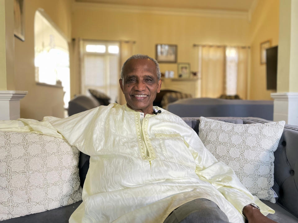 Abdullahi Ahmed An-Naim sits for a portrait in his home in Tucker, Georgia, on March 6, 2023. An-Naim, an expert in human rights law who retired from Emory University in Atlanta in 2022, says former U.S. President Jimmy Carter saved his life by intervening with Sudan's dictator in 1984 to free him and 50 other political prisoners. (AP Photo/Sharon Johnson)