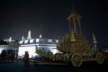 The Great Victory Royal Chariot is pulled by Thai army officials dressed in ancient uniforms in preparation for the Royal Cremation ceremony of Thailand’s late King Bhumibol Adulyadej near the Grand Palace in Bangkok, Thailand, October 26, 2017. REUTERS/Athit Perawongmetha