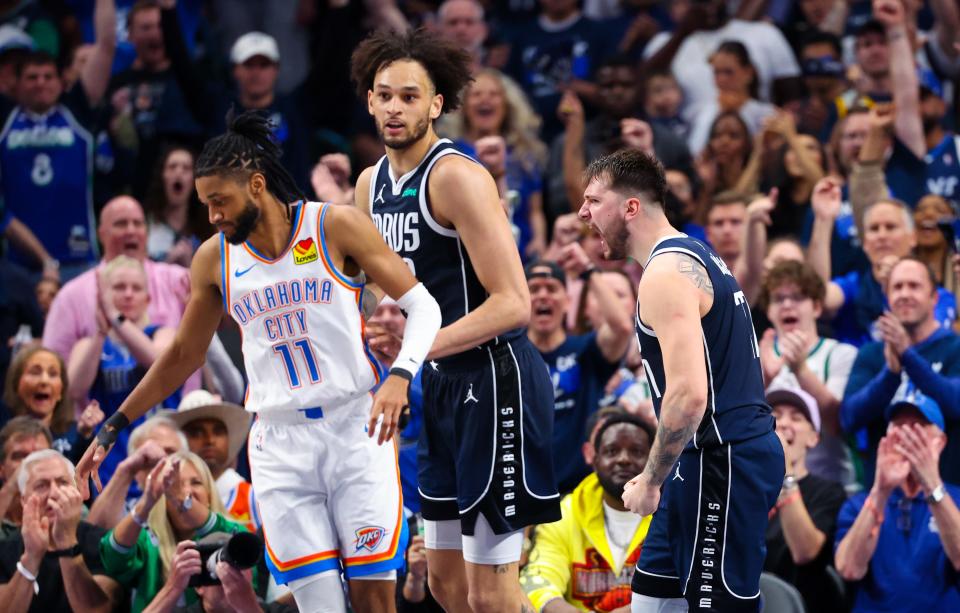 May 11, 2024; Dallas, Texas, USA; Dallas Mavericks guard Luka Doncic (77) reacts after scoring in front of Oklahoma City Thunder guard Isaiah Joe (11) during the second half during game three of the second round for the 2024 NBA playoffs at American Airlines Center.