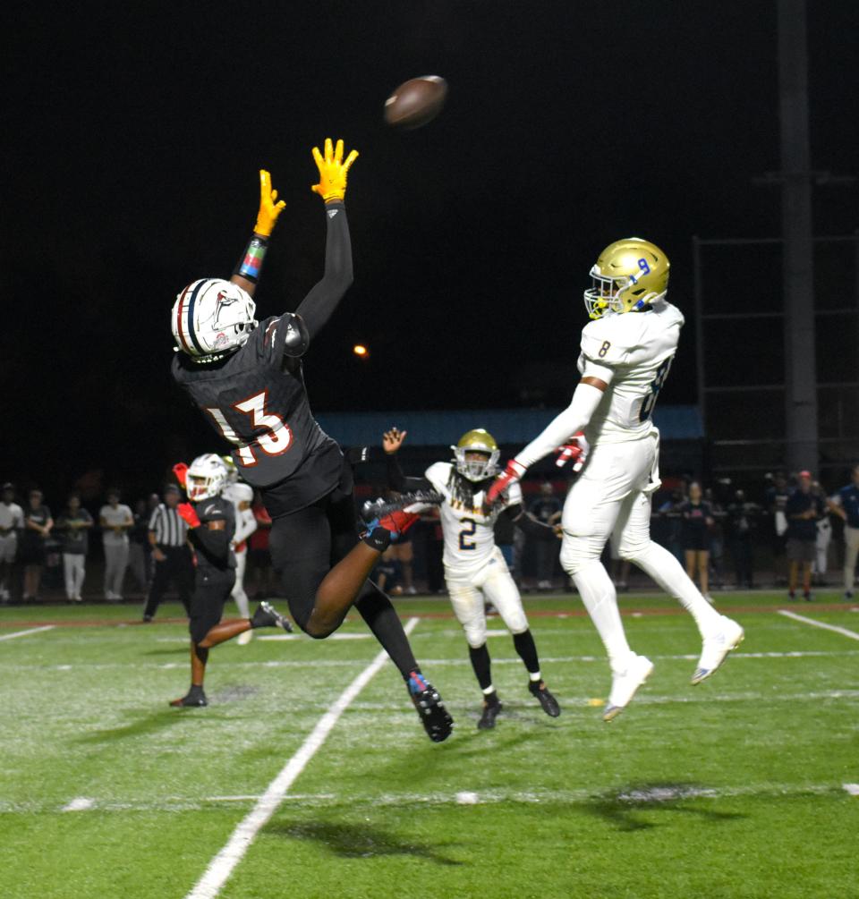 Chaminade-Madonna's Denairius Gray makes a leaping catch against Cardinal Newman on Nov. 24, 2023.