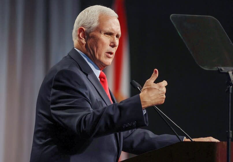Former Vice President Mike Pence speaks to the Federalist Society on Feb. 4, 2022, in Lake Buena Vista, Fla.