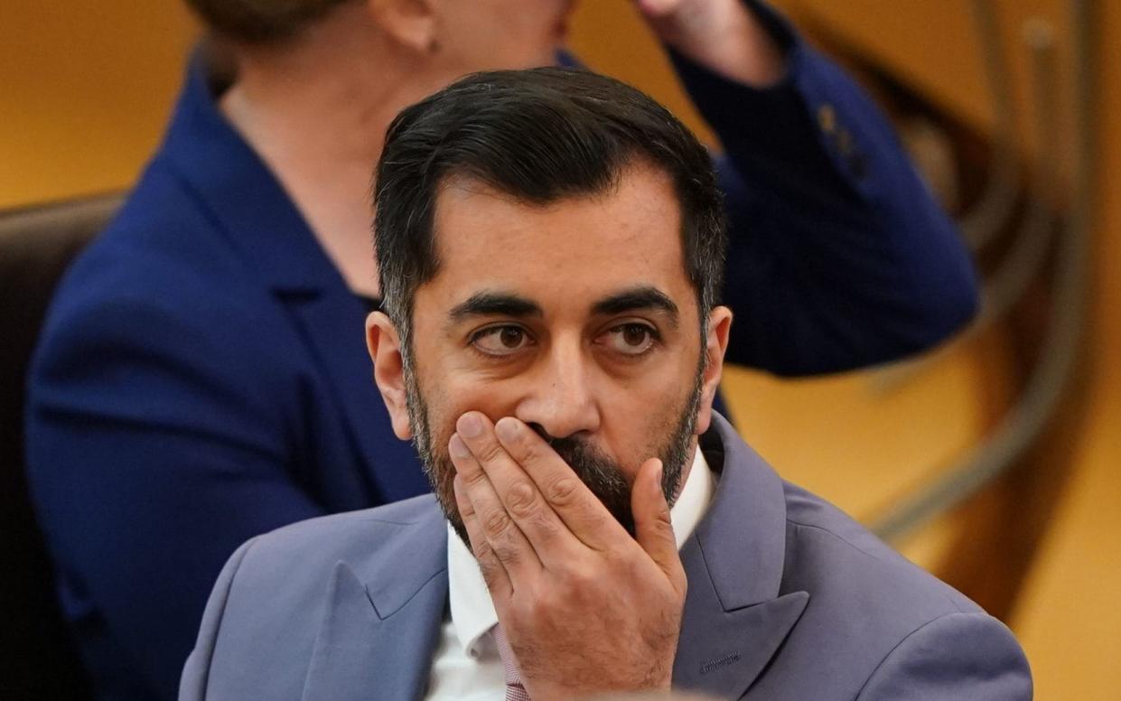 Newly elected First Minister of Scotland Humza Yousaf reacts to protesters causing a disturbance during First Minster's Questions (FMQ's) at the Scottish Parliament in Holyrood, Edinburgh. - Andrew Milligan/PA