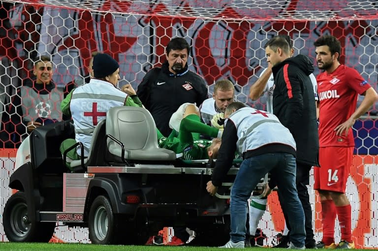 Spartak Moscow's goalkeeper from Russia Artem Rebrov is transported off the field after being injured during the UEFA Champions League Group E football match against Liverpool September 26, 2017