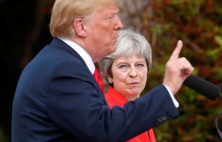 U.S. President Donald Trump and British Prime Minister Theresa May hold a press conference after their meeting at Chequers in Buckinghamshire, Britain July 13, 2018. REUTERS/Kevin Lamarque