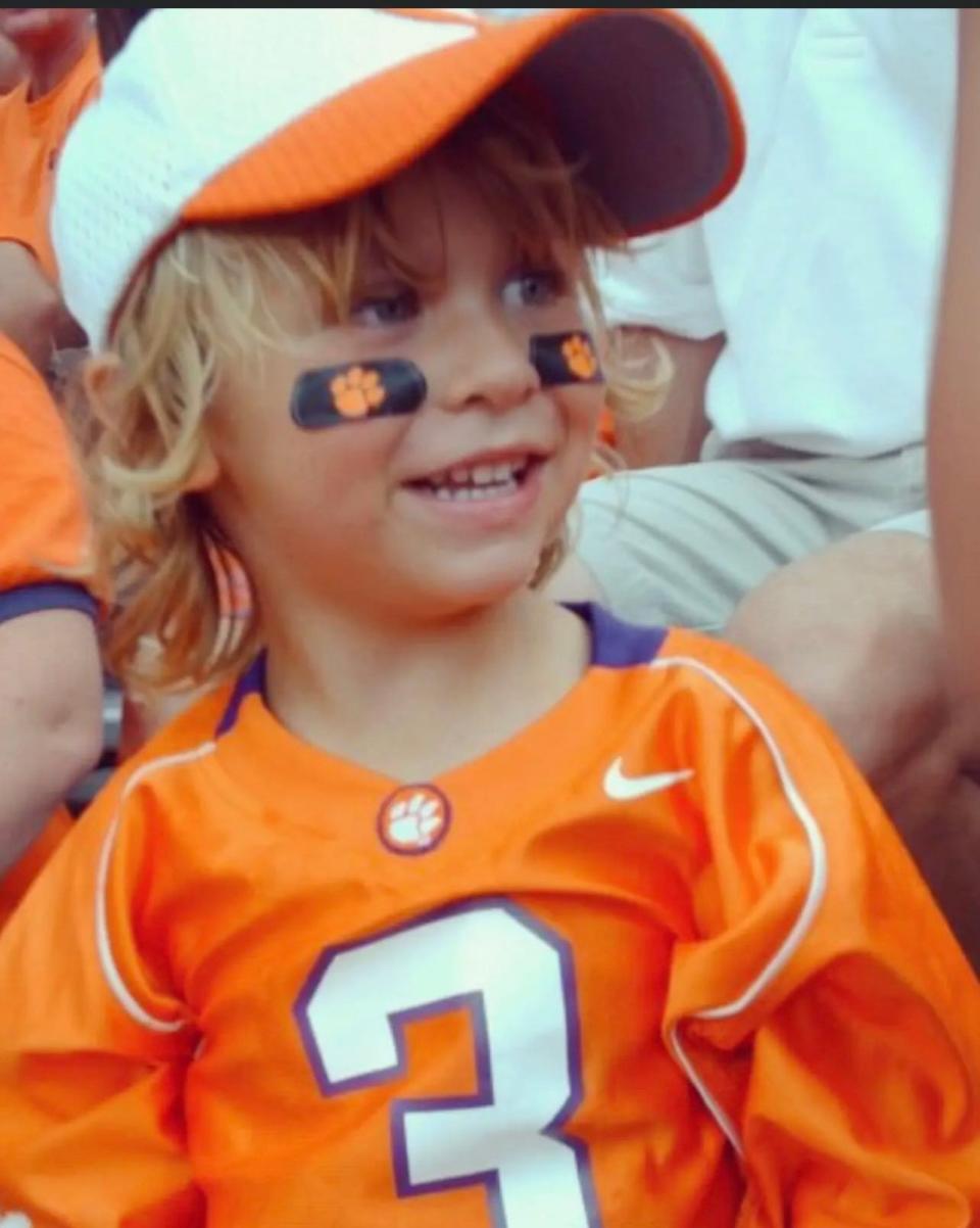 Four-year-old Nolan Hauser attending the Clemson hall of fame game when his mom, Sheri, was inducted into the Clemson Athletics Hall of Fame in 2009.