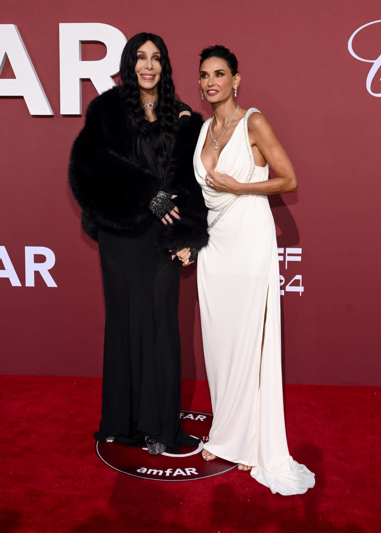 Cher and Demi Moore at the amfAR Gala Cannes 2024 held at the Hotel du Cap-Eden-Roc on May 23, 2024 in Cap d'Antibes, France.