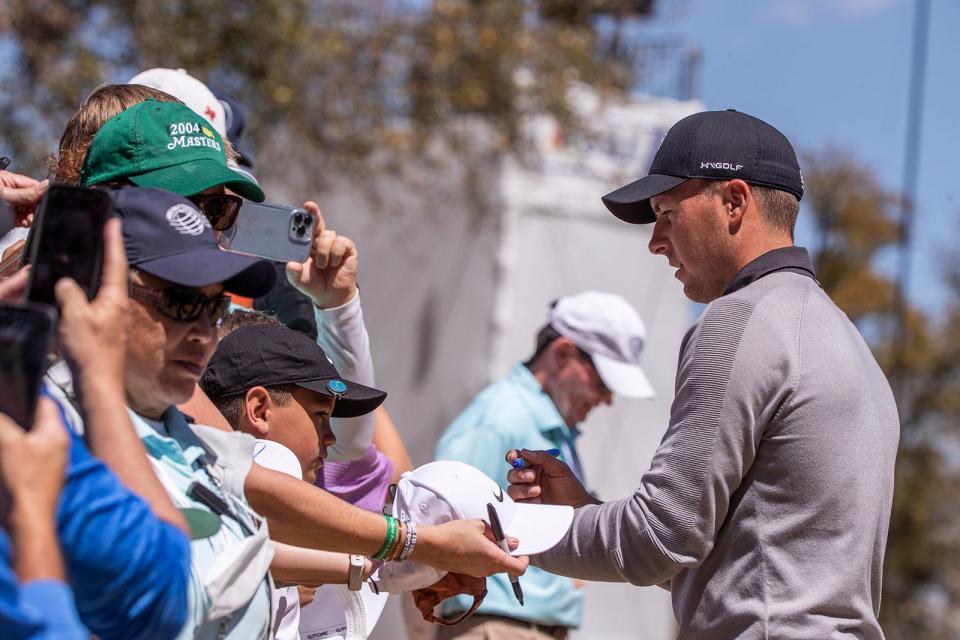 Former Texas Longhorns star Jordan Spieth signs autographs for fans at this year's World Golf Championship-Dell Technologies Match Play Championship at the Austin Country Club. The PGA Tour's contract with the golf course runs out next year.