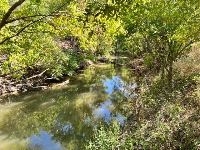 Plum Creek in Lockhart Texas is said to be the sight of an eyewitness encounter with the "Texas Dogman," a werewolf type creature described in folklore. Aaron Deese, author of "The Texas Dogman Triangle" has researched the subject.