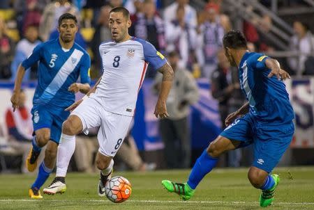 United States forward Clint Dempsey (8) dribbles the ball while Guatemala defender Carlos Castrillo (13) defends in the first half of the game during the semifinal round of the 2018 FIFA World Cup qualifying soccer tournament at MAPFRE Stadium. Trevor Ruszkowski-USA TODAY Sports