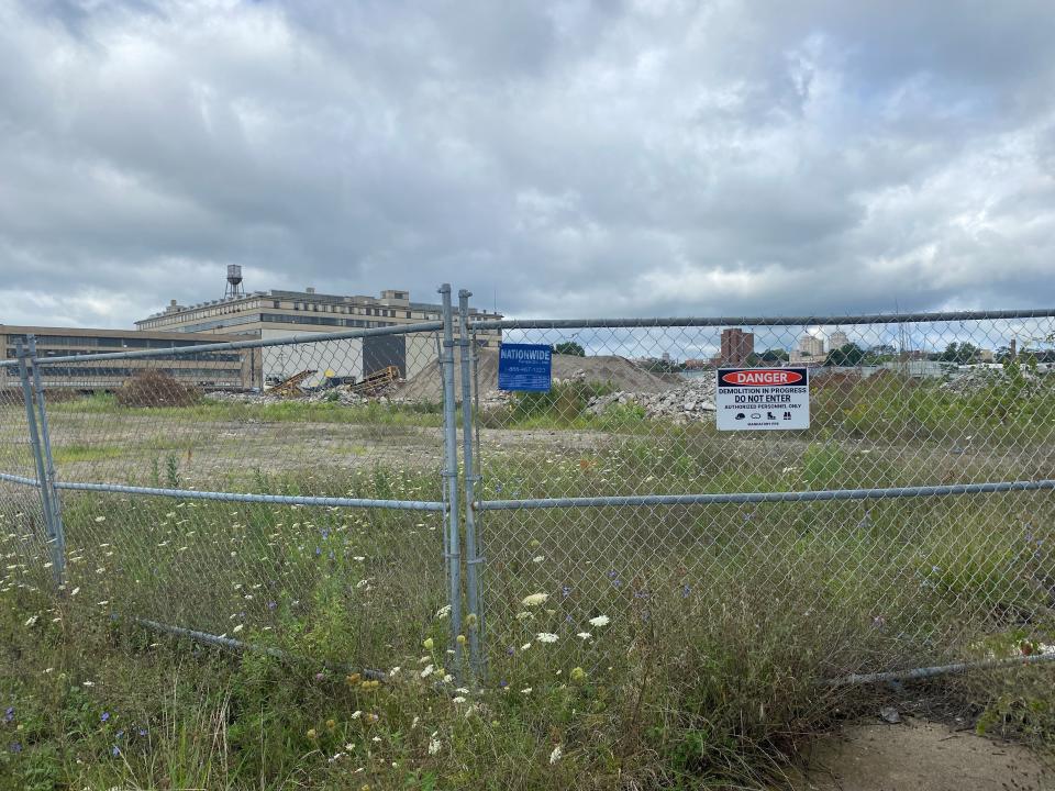 The former Westinghouse site under demolition was quiet Tuesday along West Fifth Street. Three water lines are running nonstop here and the city has been working to resolve the matter for about 12 weeks, according to the Richland County Land Bank.