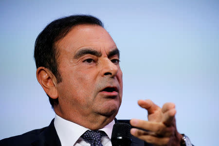 FILE PHOTO: Carlos Ghosn, chairman and CEO of the Renault-Nissan-Mitsubishi Alliance, speaks at the Tomorrow In Motion event on the eve of press day at the Paris Auto Show, in Paris, France, October 1, 2018. REUTERS/Regis Duvignau/File Photo