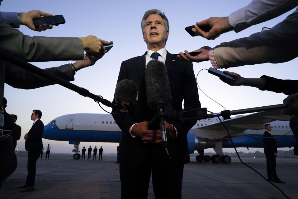 FILE - Secretary of State Antony Blinken speaks to members of the media before leaving Cairo, Oct. 15, 2023, en route to Jordan. AP Washington photographer Jacquelyn Martin recalls how being one of a few female photographers covering news and politics was useful when she was assigned as the press pooler for Blinken's last-minute trip to Israel and the Middle East in the aftermath of the Hamas attacks. Martin said, “Sometimes people not knowing what to make of you works in your favor.” (AP Photo/Jacquelyn Martin, Pool, File)