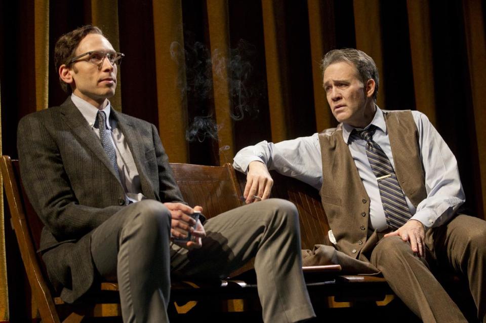 In this theater image released by Boneau/Bryan-Brown, Stephen Kunken portrays David Halberstam, left, and Boyd Gaines portrays Stewart Alsop in a scene from the play "The Columnist," playing at the Samuel J. Friedman Theatre in New York. (AP Photo/Boneau/Bryan-Brown, Joan Marcus)