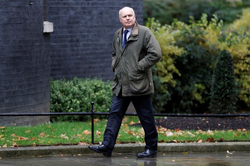 Britain's Conservative MP Iain Duncan Smith walks outside Downing Street ahead of government's attempt to win the backing of MPs for Brexit deal, in London