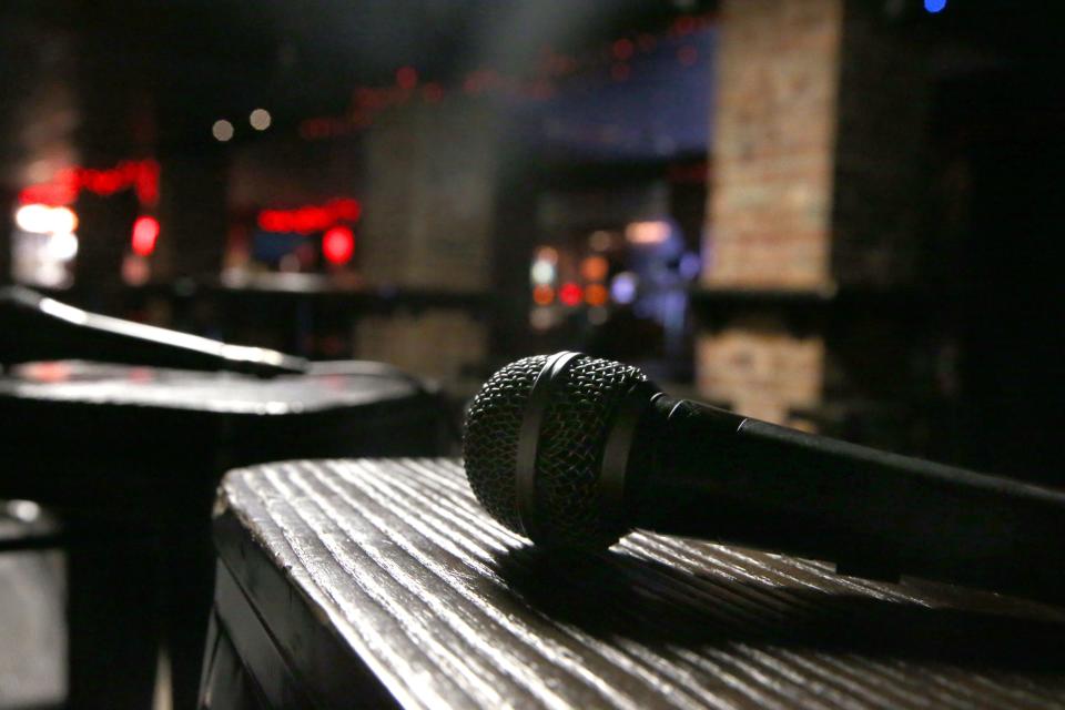 A microphone sits on a stool on Alleycat's stage Tuesday, April 23, 2024 in downtown Iowa City, Iowa.