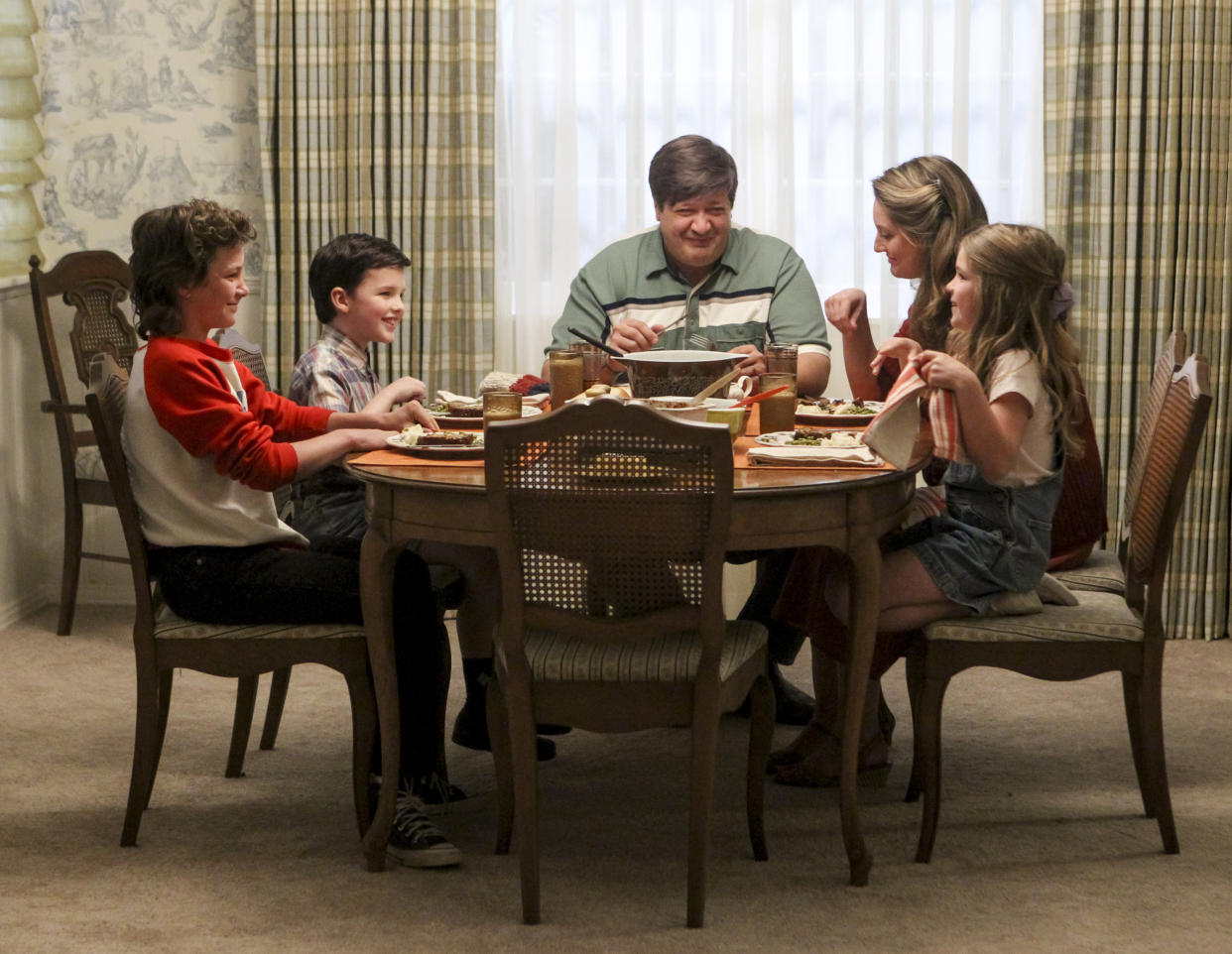 A family dinner-table scene from 