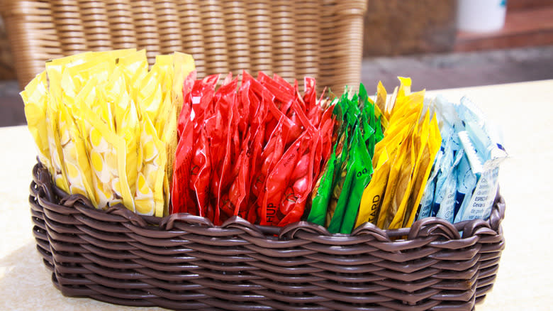 Basket of sauce packets