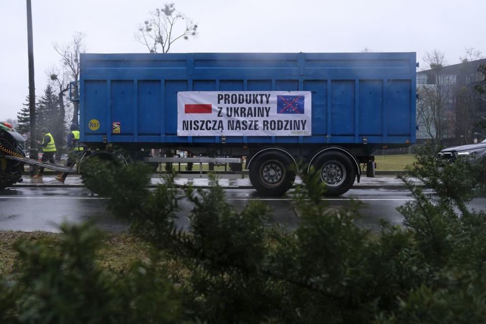 A sign on a tractor-trailer reads 'Products From Ukraine Destroy Our Families' during a protest by Polish farmers in Poznan, Poland, on Feb. 9, 2024. Photo for illustrative purposes. (Damian Lemaski/Bloomberg via Getty Images)