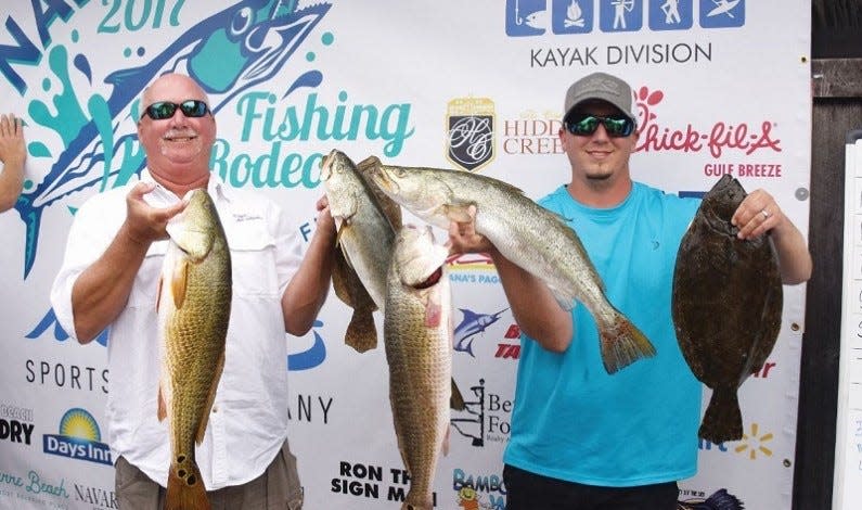 Local anglers Jim Olson and Brandon Semsick with their catch during a previous Navarre Fishing Rodeo.