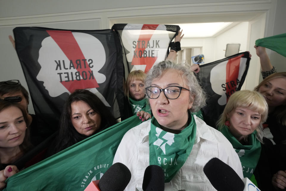 Women's rights leader, Marta Lempart, speaks to reporters after the Polish parliament voted to continue work on proposals to liberalize Poland's strict abortion law, in Warsaw, Poland, on Friday April 12, 2024. Polish lawmakers voted Friday to continue work on proposals to lift a near total ban on abortion, a divisive issue in the traditionally Roman Catholic country, which has one of the most restrictive laws in Europe. (AP Photo/Czarek Sokolowski)