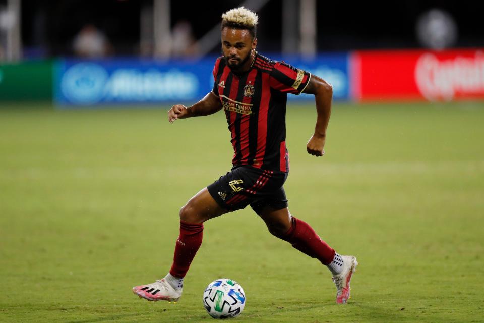 REUNION, FLORIDA - JULY 21:  Anton Walkes #4 of Atlanta United runs with the ball against Columbus Crew during a Group E match as part of the MLS Is Back Tournament at ESPN Wide World of Sports Complex on July 21, 2020 in Reunion, Florida. (Photo by Michael Reaves/Getty Images)