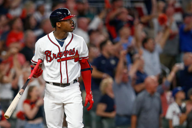 LOS ANGELES, CA - AUGUST 31: Atlanta Braves right fielder Ronald Acuna Jr.  (13) hits a grand slam, becoming the first player in history to have 30 home  runs and 60 steals