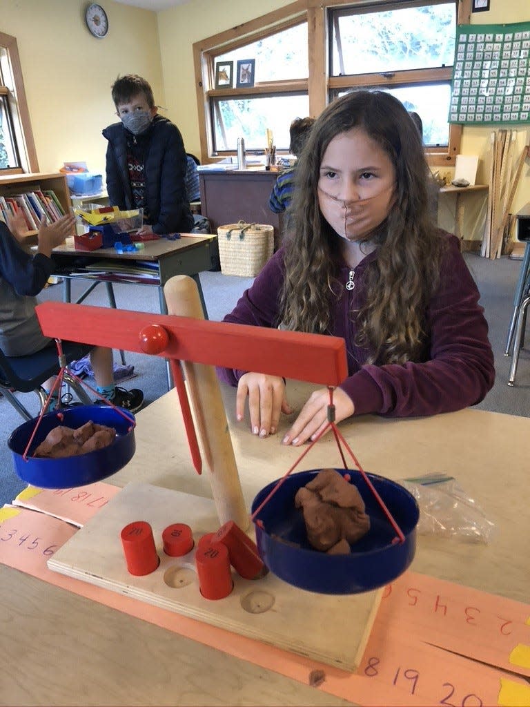 A third grade classroom at Lake Champlain Waldorf School works on weights and measures, fall 2021.