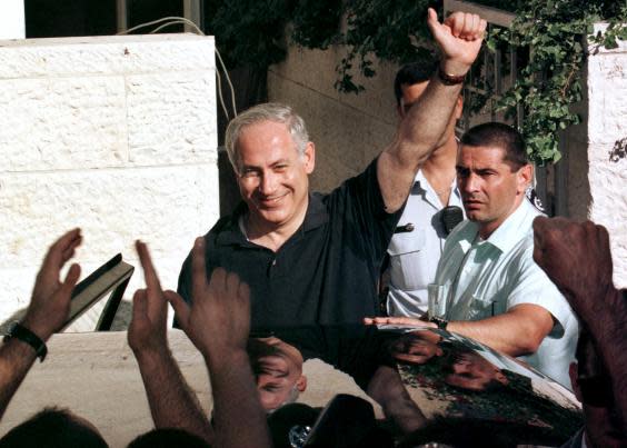 Benjamin Netanyahu celebrates winning in 1996 after that year’s May elections, receiving 50.4 per cent of the vote to Shimon-Peres‘ 49.5 per cent (Reuters/ Jim Hollander)