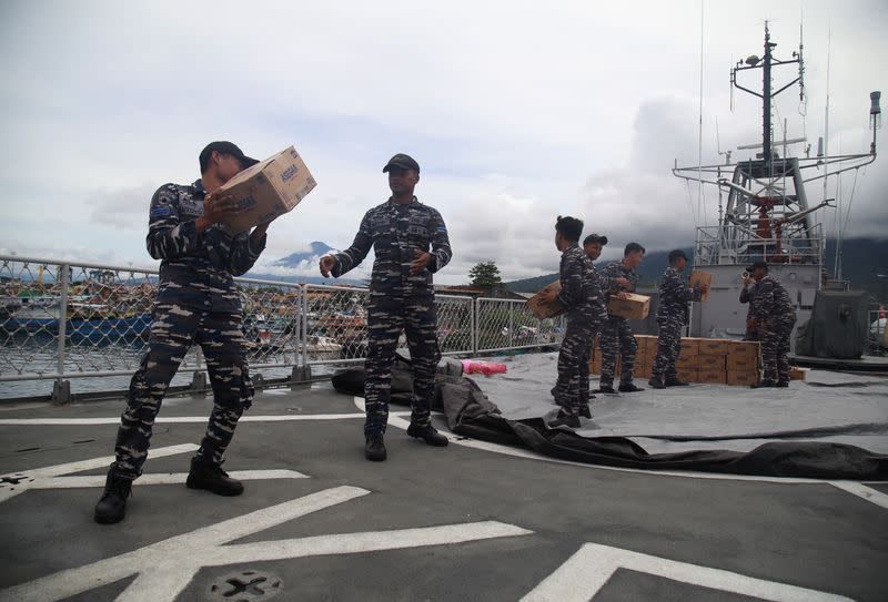 Indonesian Navy distribute logistics for people following Mount Ruang volcano eruption, in Bitung