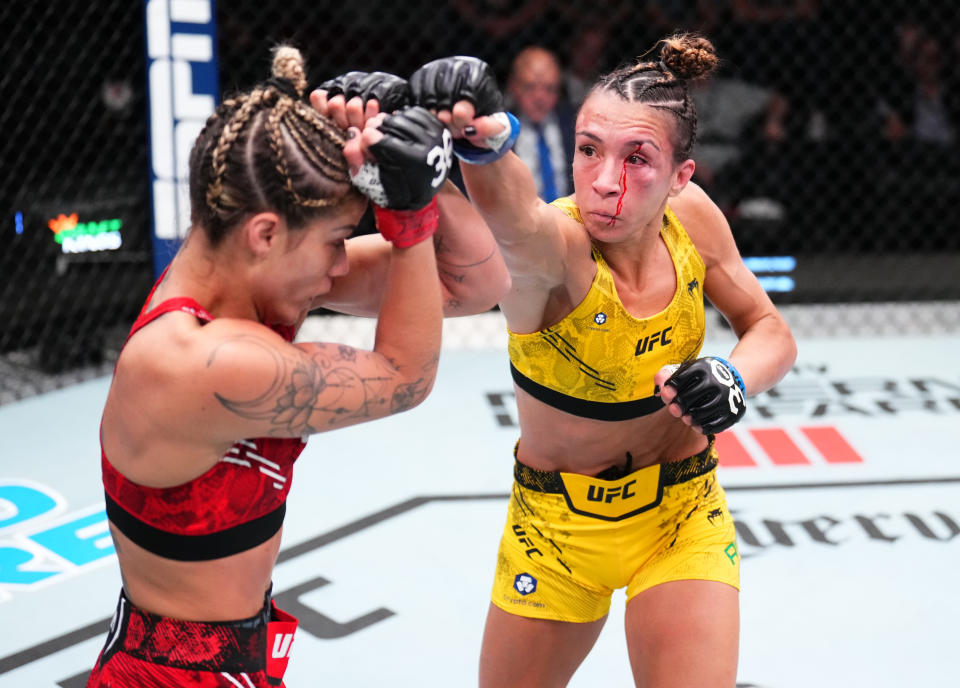 LAS VEGAS, NEVADA – NOVEMBER 18: (R-L) Amanda Ribas of Brazil punches Luana Pinheiro of Brazil in a strawweight fight during the UFC Fight Night event at UFC APEX on November 18, 2023 in Las Vegas, Nevada. (Photo by Chris Unger/Zuffa LLC via Getty Images)