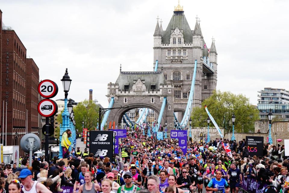 Runners cross Tower Bridge during the TCS London Marathon (Aaron Chown/PA) (PA Wire)