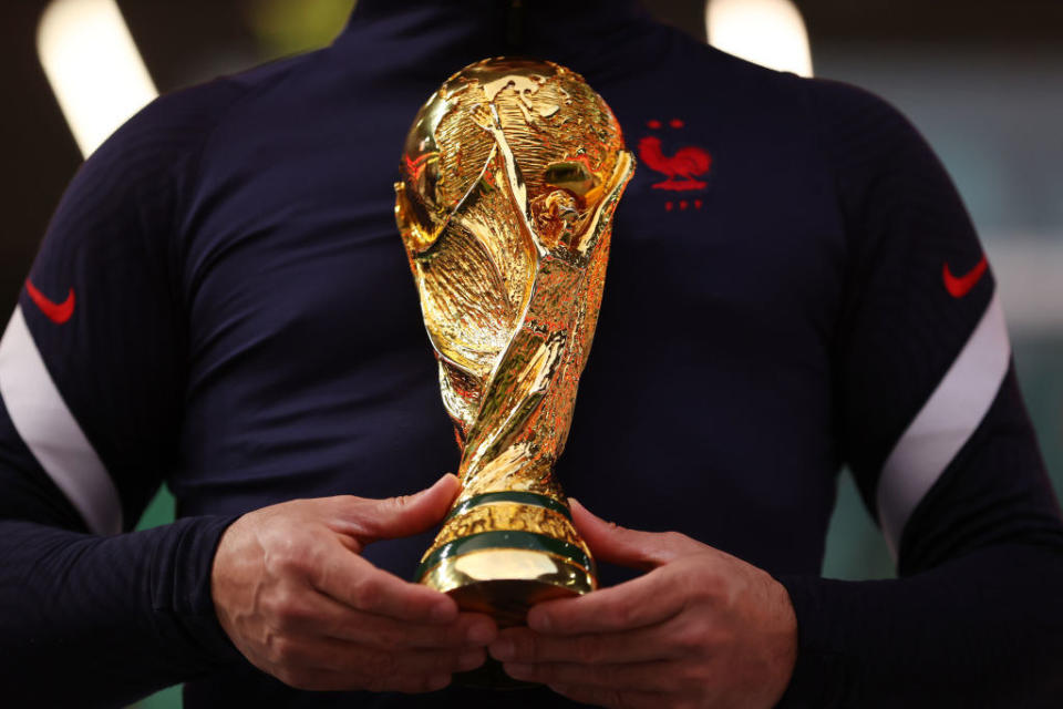 closeup of a player holding the trophy