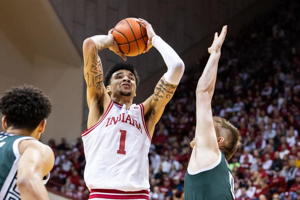 Indiana Hoosiers center Kel'el Ware (1) shoots the ball while Michigan State Spartans forward Jaxon Kohler (0) defends in the first half at Simon Skjodt Assembly Hall.