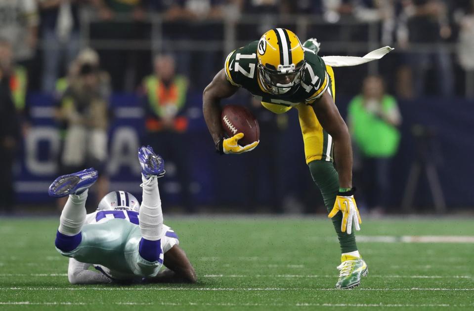 <p>Davante Adams #17 of the Green Bay Packers catches a pass during the third quarter against the Dallas Cowboys in the NFC Divisional Playoff game at AT&T Stadium on January 15, 2017 in Arlington, Texas. (Photo by Ronald Martinez/Getty Images) </p>