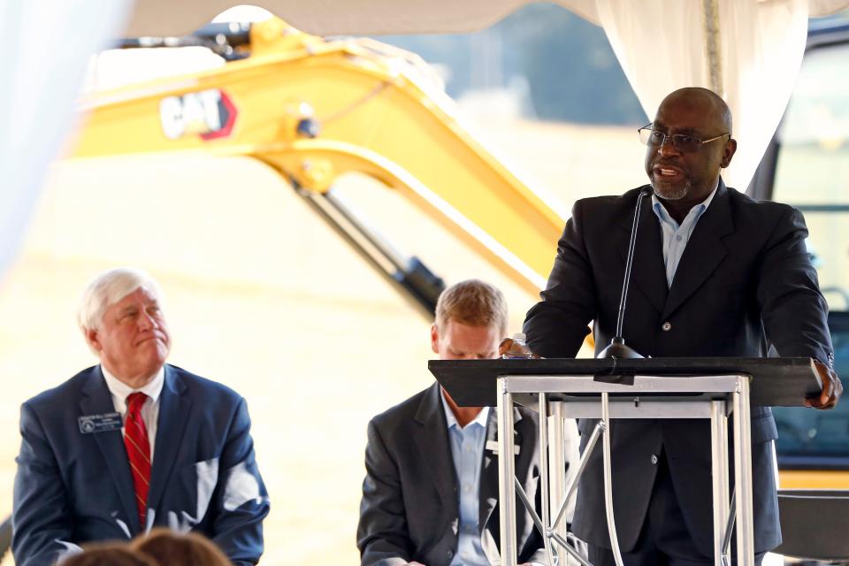 Errol Wint, the Athens Facility Manager for the plant, speaks to a crowd Wednesday during an observance of Caterpillar's 10-year anniversary of operations.
