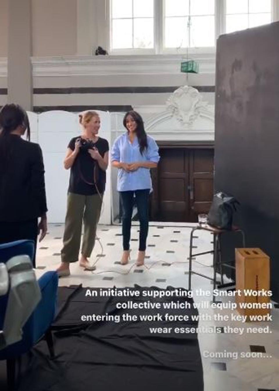 Duchess of Sussex chatting to a photographer (PA)