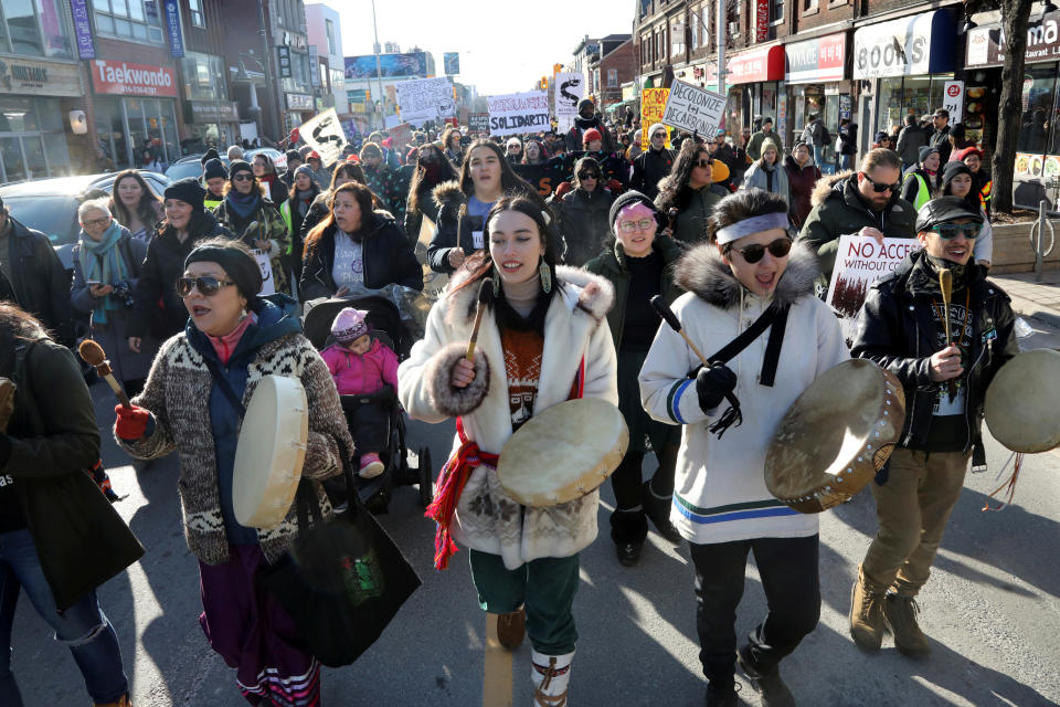 Supporters of the indigenous Wet'suwet'en Nation march as part of a protest against British Columbia's Coastal GasLink pipeline, in Toronto, Ontario, Canada February 17, 2020.   REUTERS/Chris Helgren