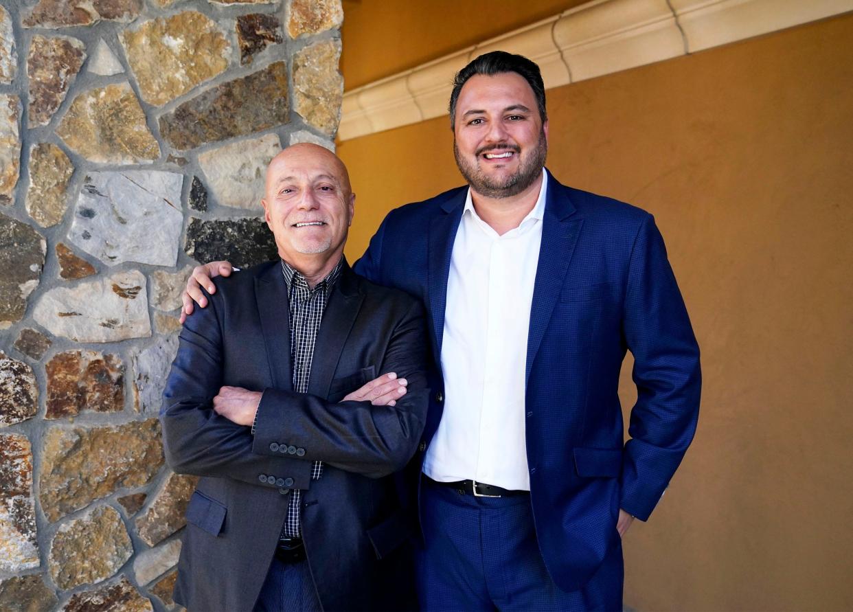 Attorney Darius Amiri (right) and his father, John Amiri (left), on Nov. 11, 2021, in Scottsdale.