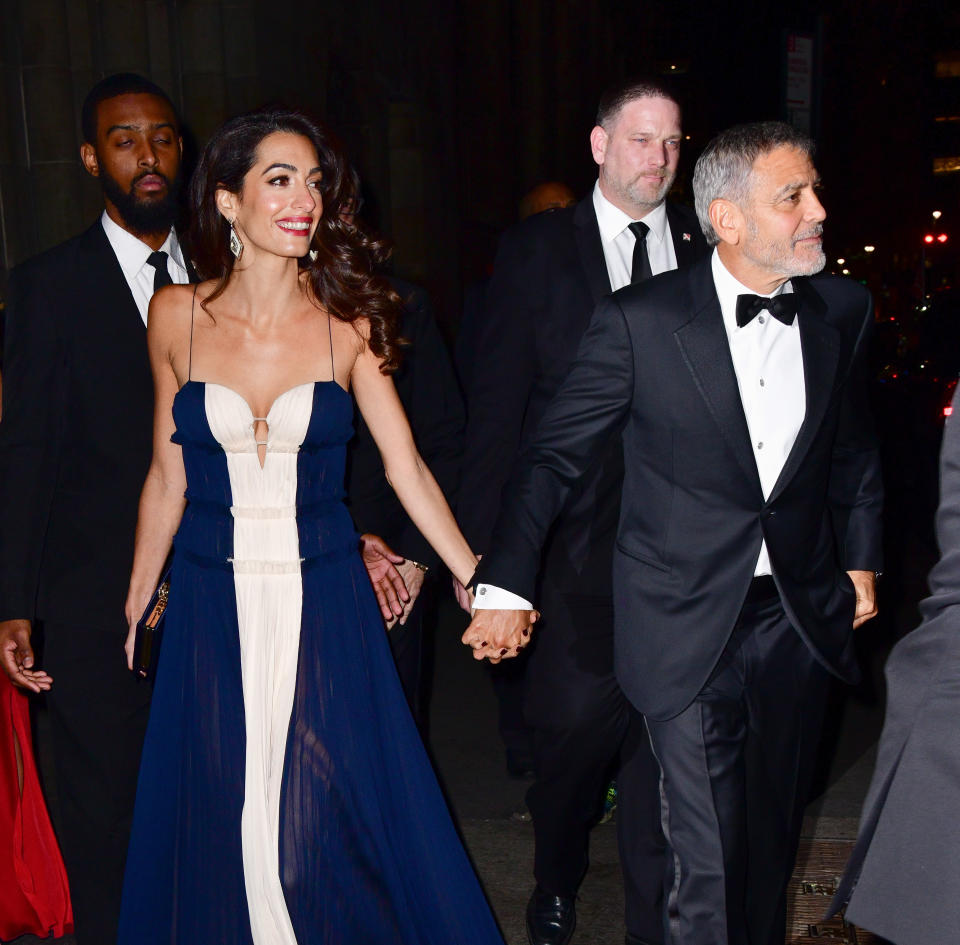 Amal Clooney, with husband George Clooney, was named Global Citizen of the Year at the U.N. Correspondents Association Awards. (Photo: James Devaney/GC Images)