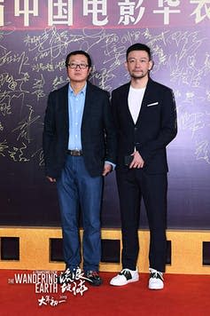 <span class="caption">Liu Cixin (left) and Frant Gwo at a promotional function for The Wandering Earth.</span> <span class="attribution"><span class="source">Netflix</span></span>