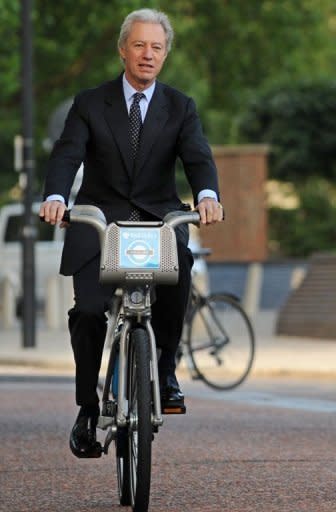 Marcus Agius rides a Barclays-sponsored hire bicycle in London in 2010. The Barclays chairman is now expected to remain at the troubled bank to lead a search for a new chief executive to replace Bob Diamond