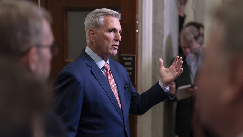 Speaker of the House Kevin McCarthy, R-Calif., talks to reporters outside his office about calls for an impeachment inquiry of President Joe Biden, at the Capitol in Washington, Tuesday, July 25, 2023.