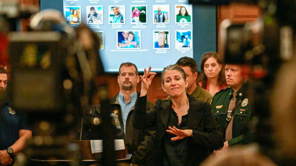 Deaf interpreter Regan Thibodeau addresses the media at a recent press conference in Lewiston, Maine. Advocates for the deaf community say the deadly attack resonated nationwide. - David Sokol/USA Today Network