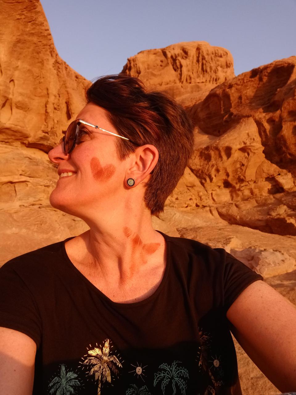 Over time Claire Macklin managed to find joy in life again, pictured here in Jordan. (Supplied)
